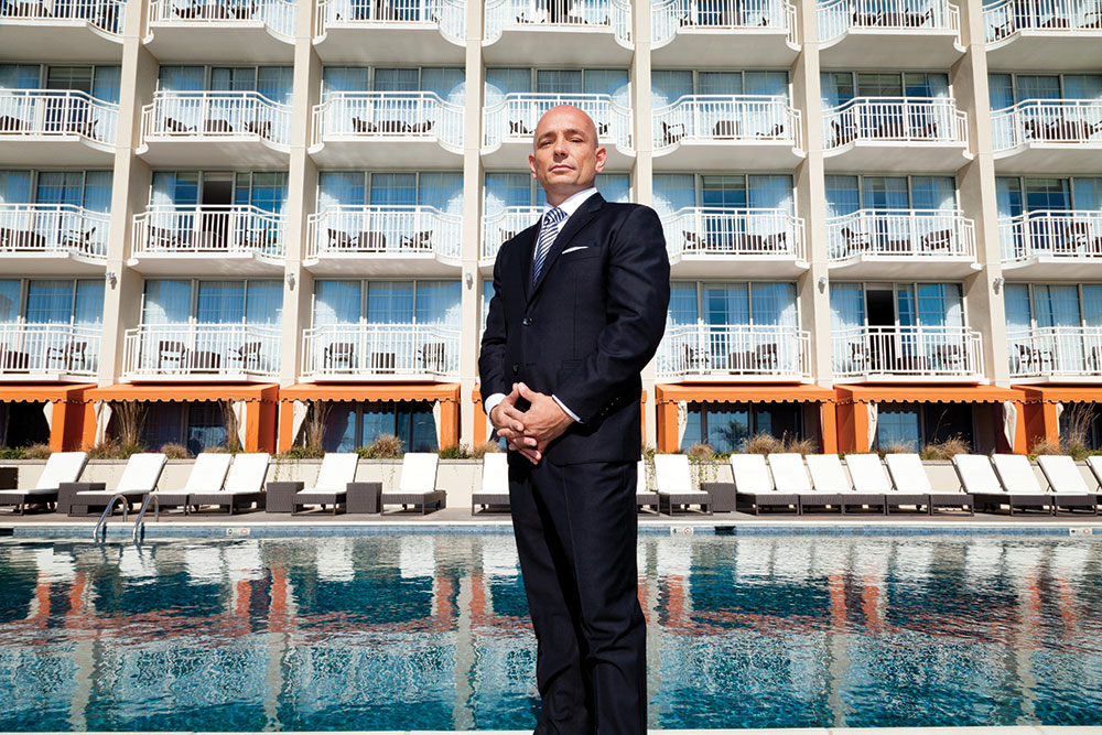 Anthony-Standing-in-front-of-Pool